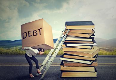 Student loan debt concept. Woman with heavy box