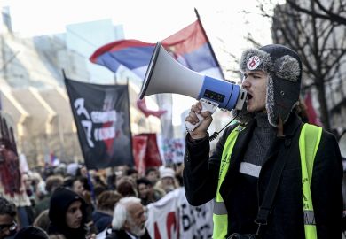 People gather to stage a protest due to government's pressure on education employees, who halted work in solidarity with the demands of students in blockade, in front of the Ministry of Education headquarters in Belgrade, Serbia on 5 February 2025.