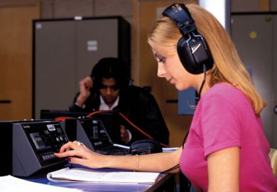 Student using college language lab