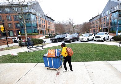 Towson University students remove their belongings from dorms Towson University students remove their belongings from dorms