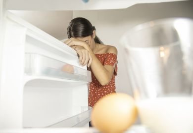 A student depressed by an empty fridge
