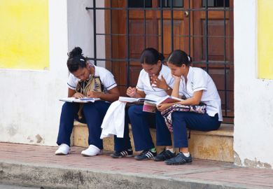 Students at work, Getsamani old town, Cartagena, Colombia Students at work, Getsamani old town, Cartagena, Colombia