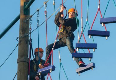 Students navigating obstacle course Students navigating obstacle course