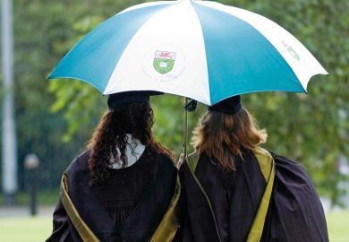 Students under an umbrella