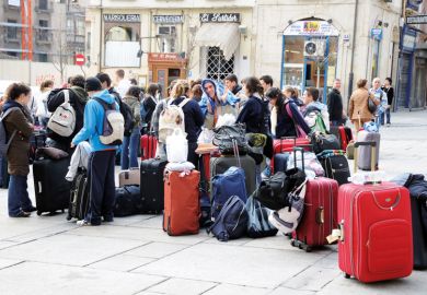 Students waiting for bus, Plaza del Poeta Iglesias, Salamanca, Spain