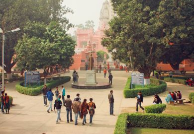 Students go to campus through the park of Bannares Hindu University