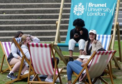 Students relaxing on deck chairs at Brunel University London