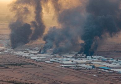 Burning buildings in Sudan