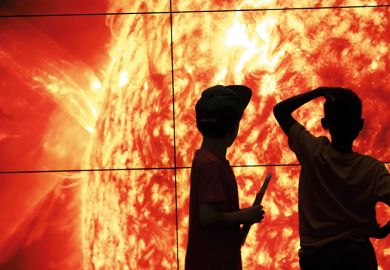 children look at the sun