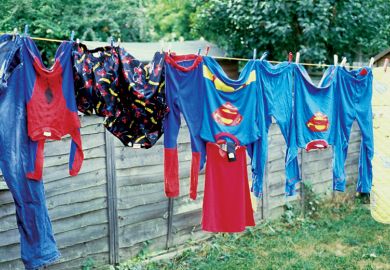 Superhero costumes hanging on a washing line