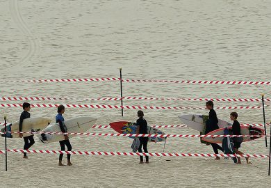 Surfers carry their boards on Sydney’s Bondi Beach after it reopened after a five week closure, autonomy, free from meddling
