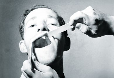 Examining teeth Examining teeth