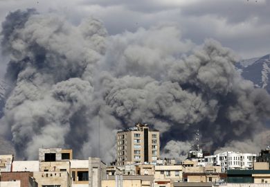 Smoke rises in Tehran after it was hit by US and Israeli missiles on March 1