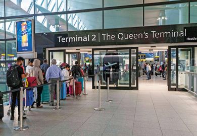 People wait in line at terminal 2, Heathrow People wait in line at terminal 2, Heathrow