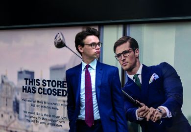 A businessman pauses next to a closed shop poster featuring a similar man also wearing a blue suit and enjoying leisure time on the golf course