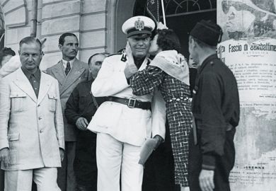Mussolini being kissed