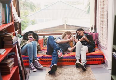 People sitting on a sofa