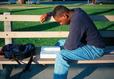 Black student on bench