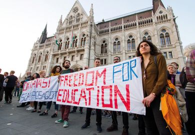 People participate in a demonstration to show support and solidarity with the Central European University (CEU) in Budapest