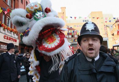 British policeman with Chinese dragon