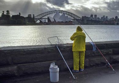 Fisherman overlooking Sydney Harbour