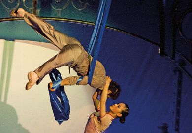 Members of the Shanghai Acrobatic Group performing at the Shanghai Centre Theatre, China