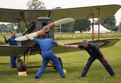 The SE5a is prepared for demonstration flight at 'The Shuttlesworth Collection' at Old Warden on July 21, 2014 in Biggleswade, England.