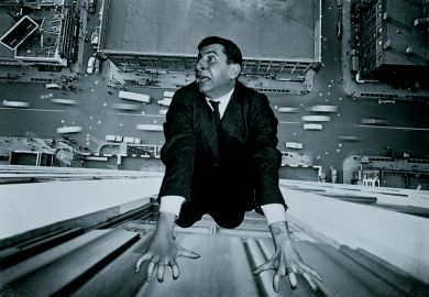 Man clinging on to outside of building