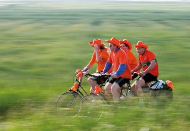people cycling on tandem bikes in the Netherlands