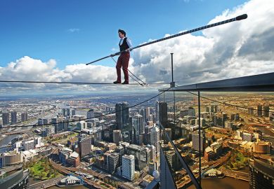High-wire artist Kane Petersen successfully walks a tightrope 300 metres above the ground at Eureka Skydeck in Melbourne, Australia.  High-wire artist Kane Petersen successfully walks a tightrope 300 metres above the ground at Eureka Skydeck in Melbourne, Australia.