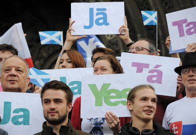 Leaflets with the word 'Yes' written in different languages are displayed. Scottish referendum, 2014.