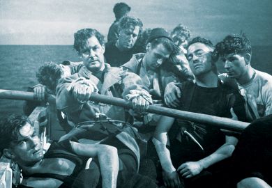 1945:  Torpedoed in the Mediterranean sea, Robert Donat (rowing) and the crew take to the life boats. Alf Goddard is in the background, and Harry Ross is second from left. From the film 'Perfect Strangers', directed by Alexander Korda for London Films.