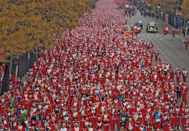 Image of Father Christmas race where people run dressed up as Santa