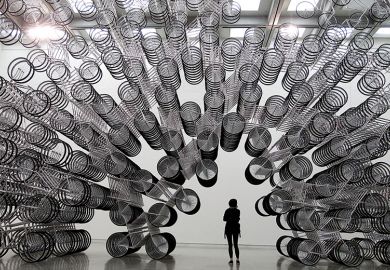A woman looks at an art installation of bicycles in Taipei October 28, 2011 A woman looks at an art installation of bicycles in Taipei October 28, 2011