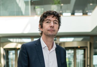 Christian Drosten, director of the Institute of Virology at Berlin's Charite hospital, is pictured after a press conference in Berlin on March 26, 2020, to comment the spread of the novel coronavirus in the country. 