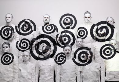 A picture shows the last artwork by Chinese artist Liu Bolin at the galerie Paris-Beijing on March 19, 2015 in Paris, France. 