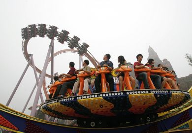 Tourists enjoy the amusement facilities at Chinese Theme Park, Beijing of China Tourists enjoy the amusement facilities at Chinese Theme Park, Beijing of China