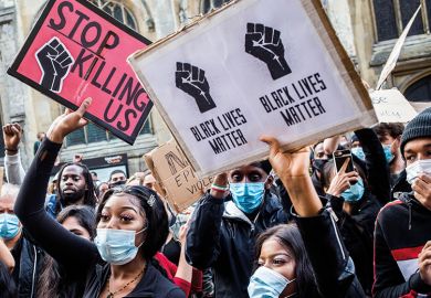 Photo of protesters in Oxford holding Black Lives Matter placards