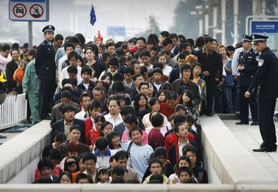 Crowd control in Beijing, China Crowd control in Beijing, China