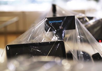 Plastic covers wrap around check-out counters in the closed restaurant and dining area inside a store in Berlin, Germany, on Wednesday, May 20, 2020