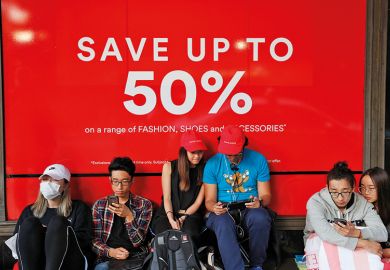 Crowds of people rush into the David Jones Elizabeth St store during the Boxing Day sales on December 26, 2018 in Sydney, Australia