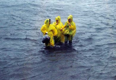 three-figures-in-flood