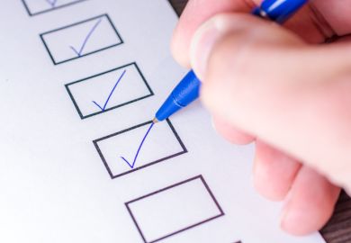 A person ticking boxes A person ticking boxes