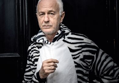 Tim Caro, University of California, Davis, dressed as zebra