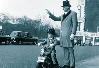 Man with boy on bike