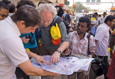 Tourists looking at a map