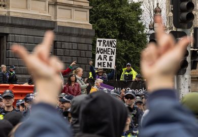 Transgender rights activists clash with members of Victoria Police as they avoid clashes with the participants of an anti-transgender rights rally happening on the steps of the Victorian Parliament on August 17, 2024, in Melbourne, Australia. 