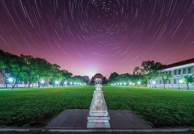 Star trails over Tsinghua University in China