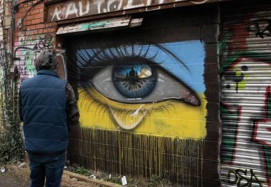 People pass a mural of president of Ukraine Volodymyr Zelenskyy, by the artist Aches, in central Dublin People pass a mural of president of Ukraine Volodymyr Zelenskyy, by the artist Aches, in central Dublin