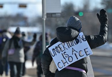 Members of the Canadian Union of Public Employees (CUPE) hold a picket demanding better education funding, braving the freezing temperatures of -24°C (-35°C with wind chill), in Edmonton, Alberta, Canada, on 19 February 2025.